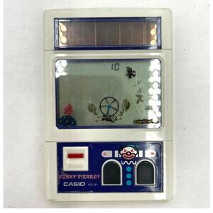 Vintage Casio CG-21 Funky Pierrot Handheld Electronic LCD Game 1982 Solar Power